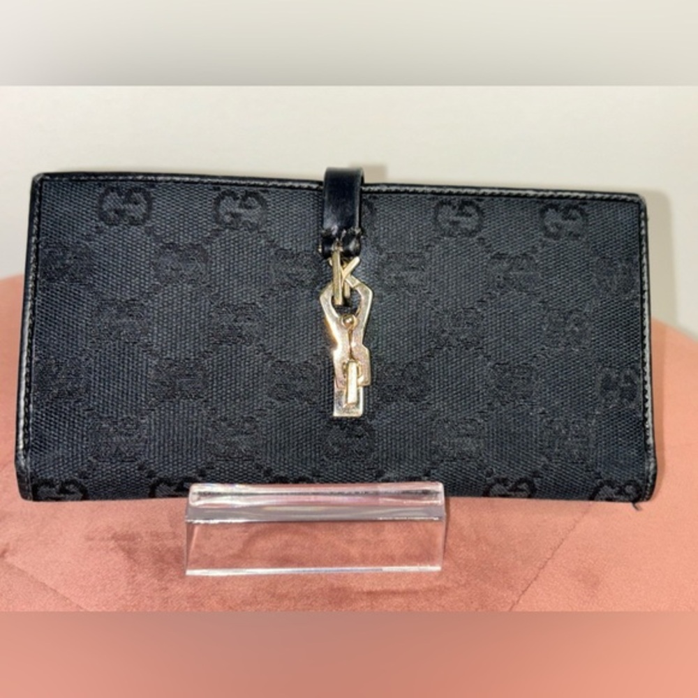 🚨Sold on diff site🚨
Gucci  Vintage Black Jackie Cloth w/ Gold Piston Lock Wallet